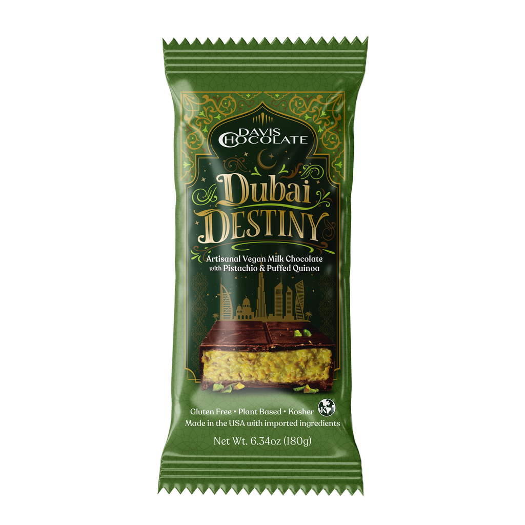Green package of Dubai Destiny chocolate with text and branding on a white background