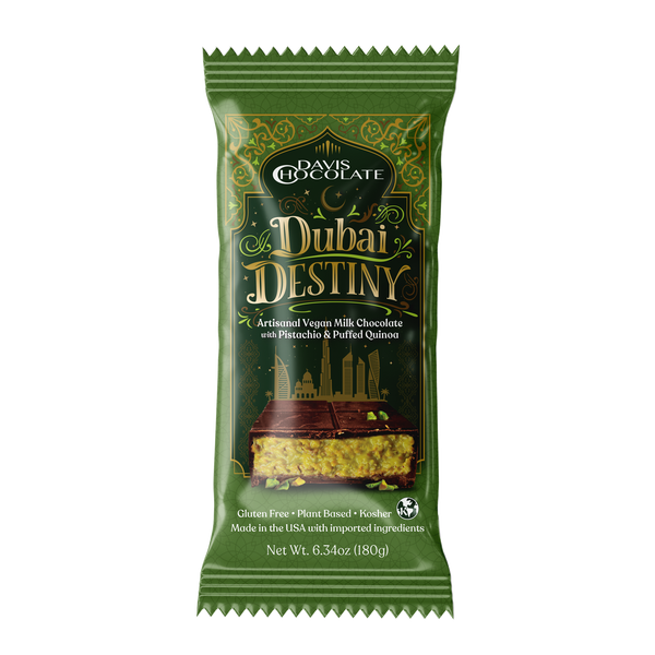 Green package of Dubai Destiny chocolate with text and branding on a white background